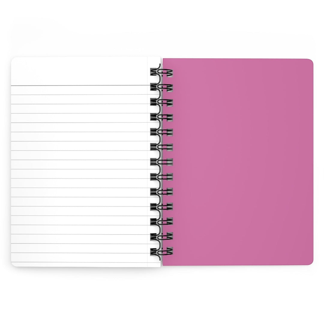 Sea Dragon Dreams spiral bound journal with a pink cover and lined paper pages open flat
