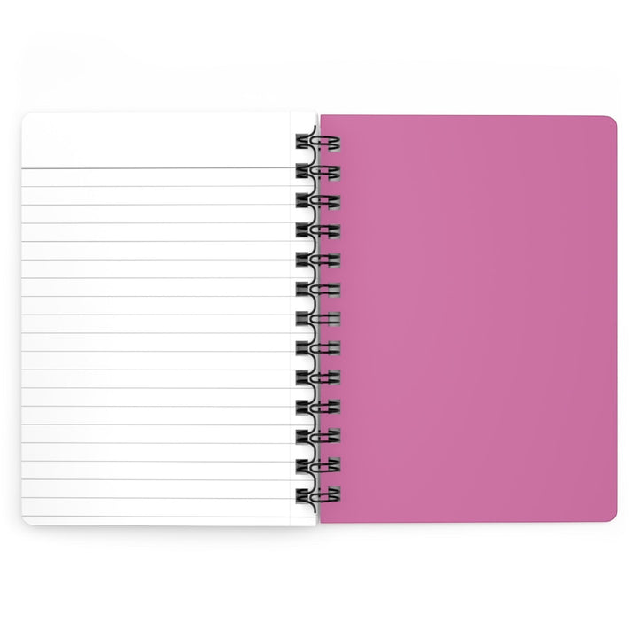 Sea Dragon Dreams spiral bound journal with a pink cover and lined paper pages open flat