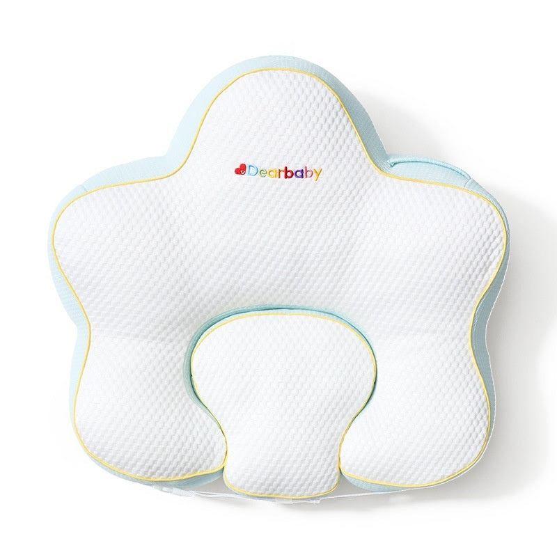 Sea Dragon Dreams star-shaped baby nursing pillow in white and light blue with yellow trim for breastfeeding support