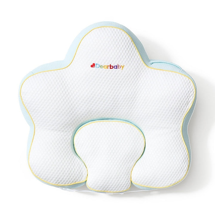 Sea Dragon Dreams star-shaped baby nursing pillow in white and light blue with yellow trim for breastfeeding support