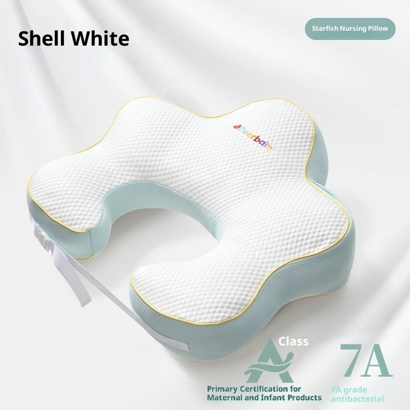 Sea Dragon Dreams shell white starfish nursing pillow with textured fabric and adjustable waist strap for feeding