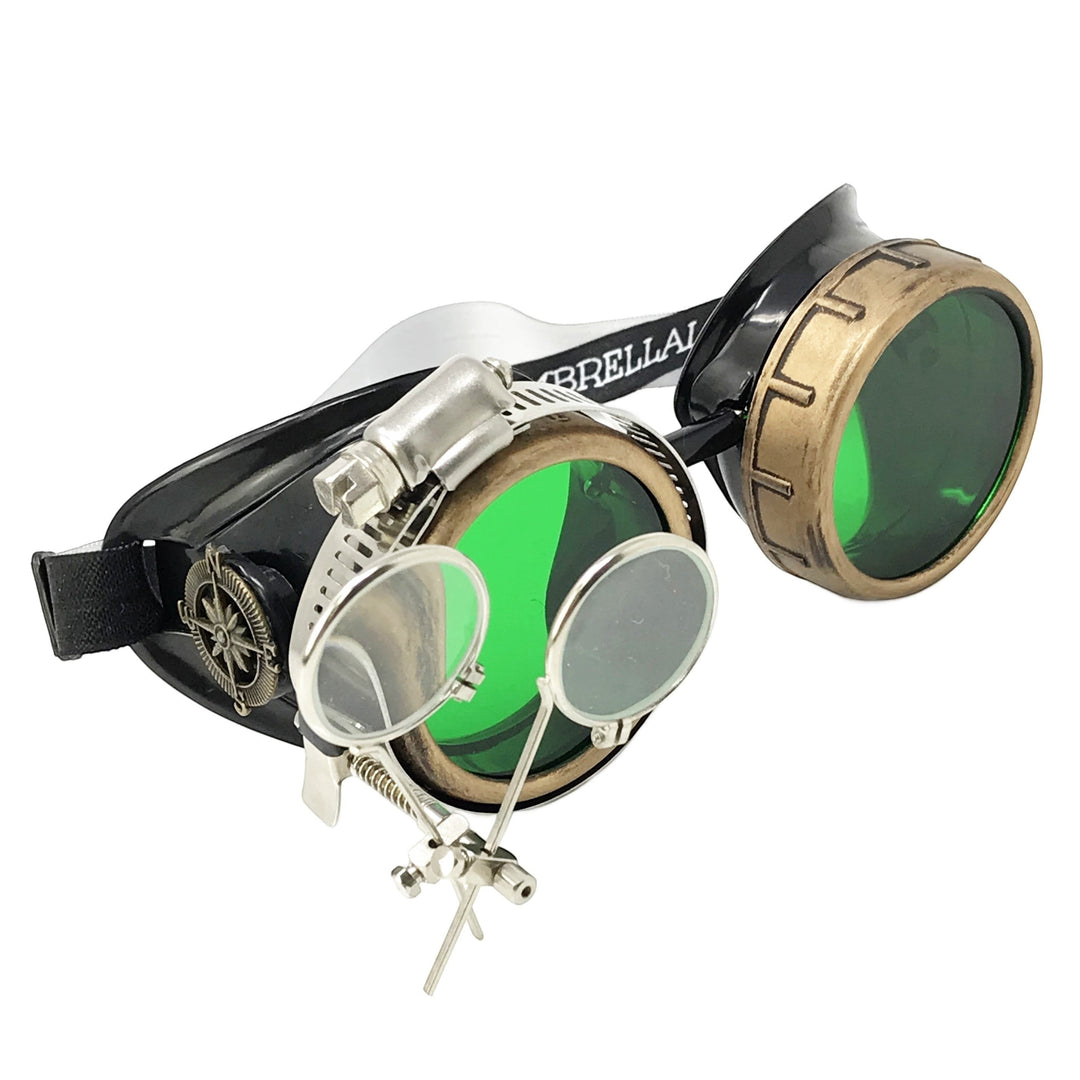 Sea Dragon Dreams handmade Victorian steampunk goggles with green lenses, bronze-tone finish, and removable loupe.
