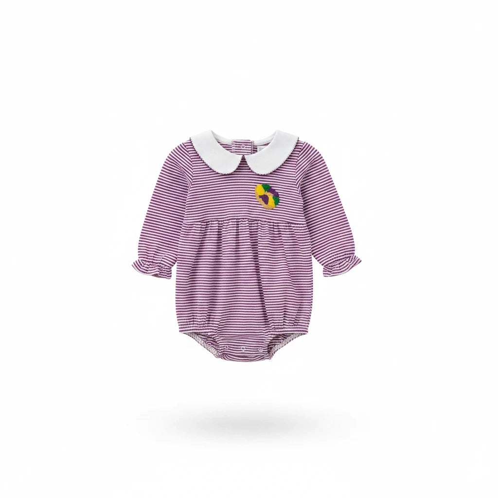Sea Dragon Dreams baby girl purple and white striped bubble romper with a Peter Pan collar and king cake patch.