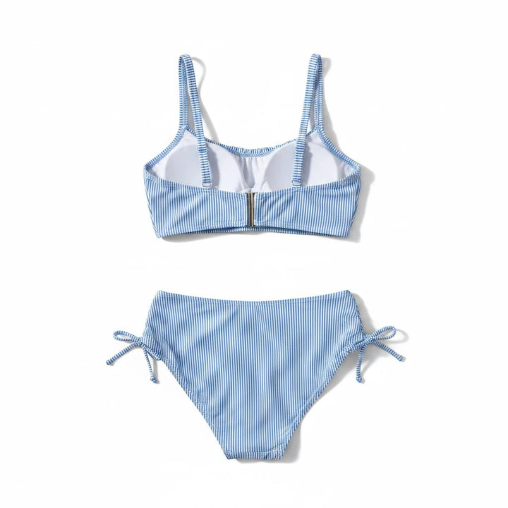 Sea Dragon Dreams blue and white striped two-piece bikini with pleated top and side-tie bottoms on white background