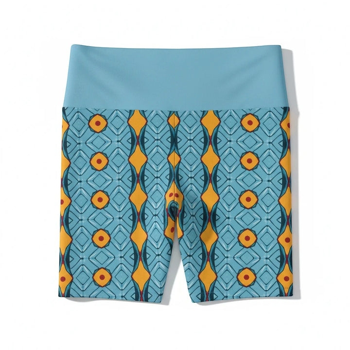 Sea Dragon Dreams women's workout shorts in light blue with a vibrant geometric orange and dark blue striped pattern.
