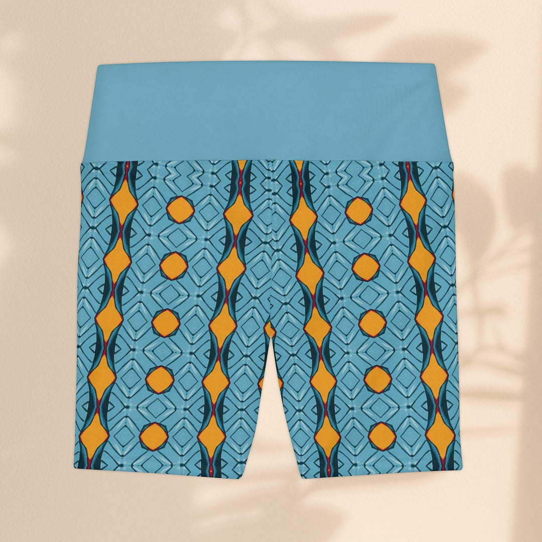 Sea Dragon Dreams women's workout shorts in blue with a vibrant geometric diamond pattern and high waistband.