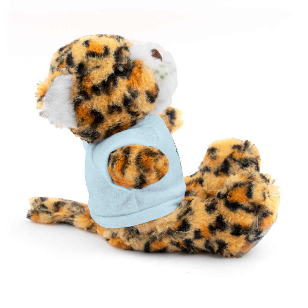 Sea Dragon Dreams stuffed jaguar plush toy wearing a light blue cotton t-shirt, side view on white background.