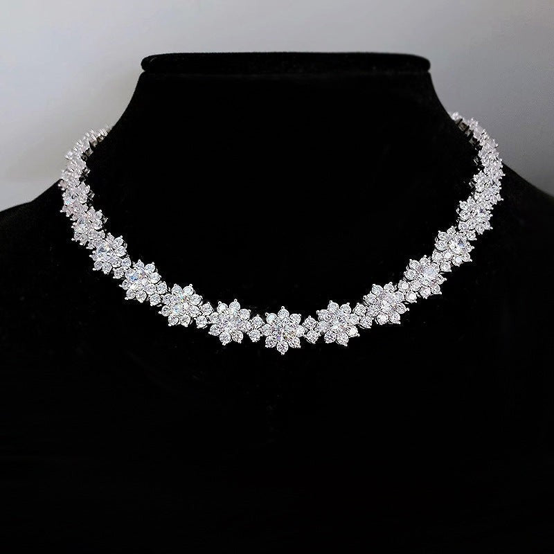 Sea Dragon Dreams sunflower diamond necklace in 925 sterling silver on a black display bust