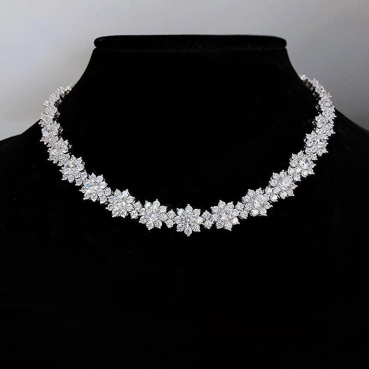 Sea Dragon Dreams sunflower diamond necklace in 925 sterling silver on a black display bust