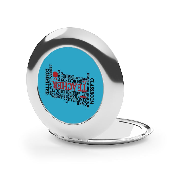 Sea Dragon Dreams round metal compact travel mirror with a blue Teacher Words design and secure snap closure
