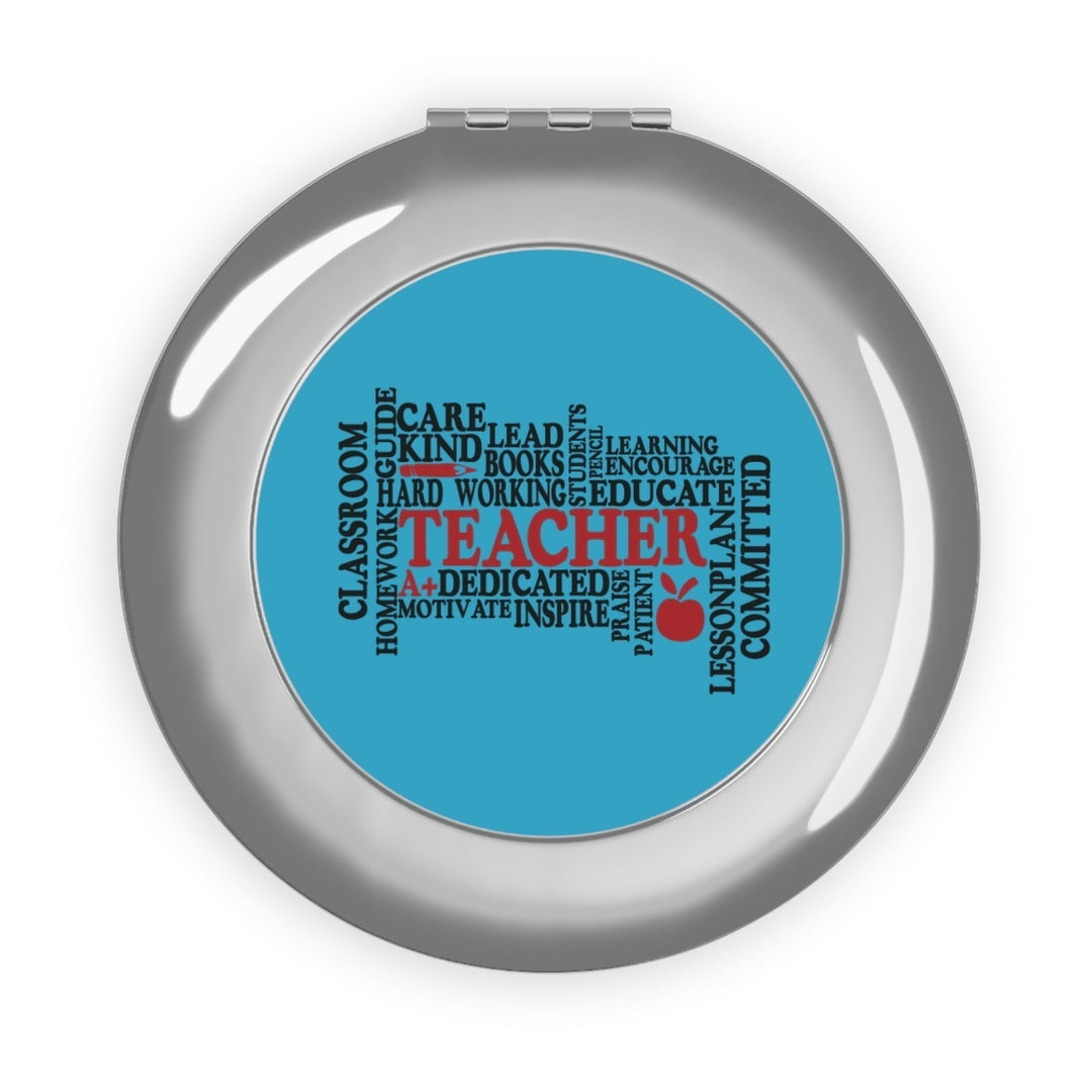 Sea Dragon Dreams round metal compact travel mirror featuring a blue teacher-themed word cloud design.