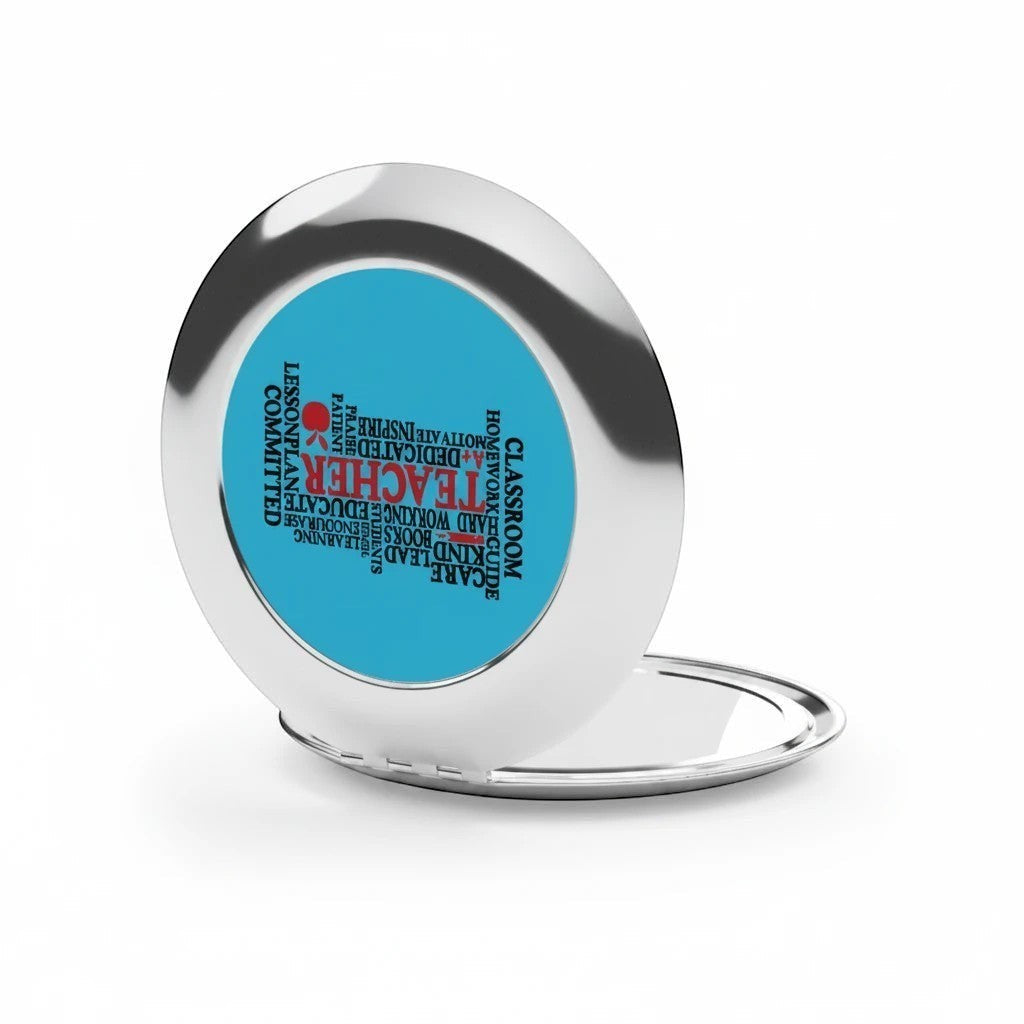 Sea Dragon Dreams round metal compact travel mirror with a blue Teacher Words design and secure snap closure.