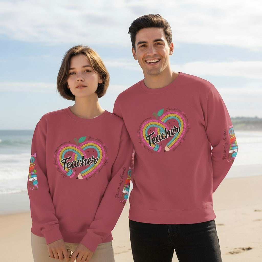 Sea Dragon Dreams unisex crewneck sweatshirt with Teachers Change The World heart pencil design on a beach.