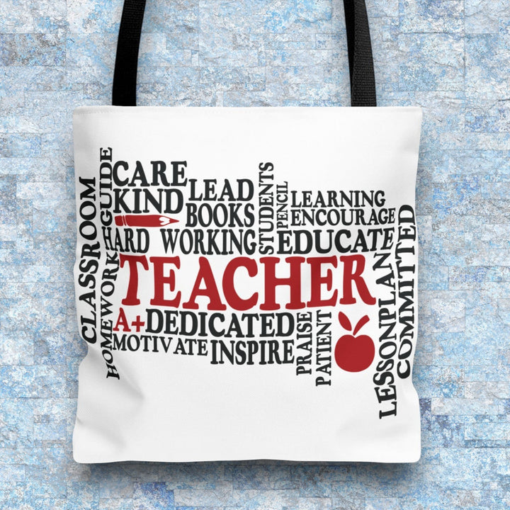 Sea Dragon Dreams What is a Teacher tote bag with black and red typography on white polyester fabric.