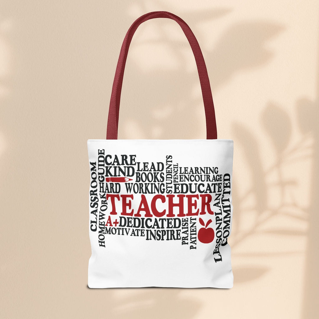 Sea Dragon Dreams What is a Teacher tote bag with red handles and black and red typography design on white polyester.