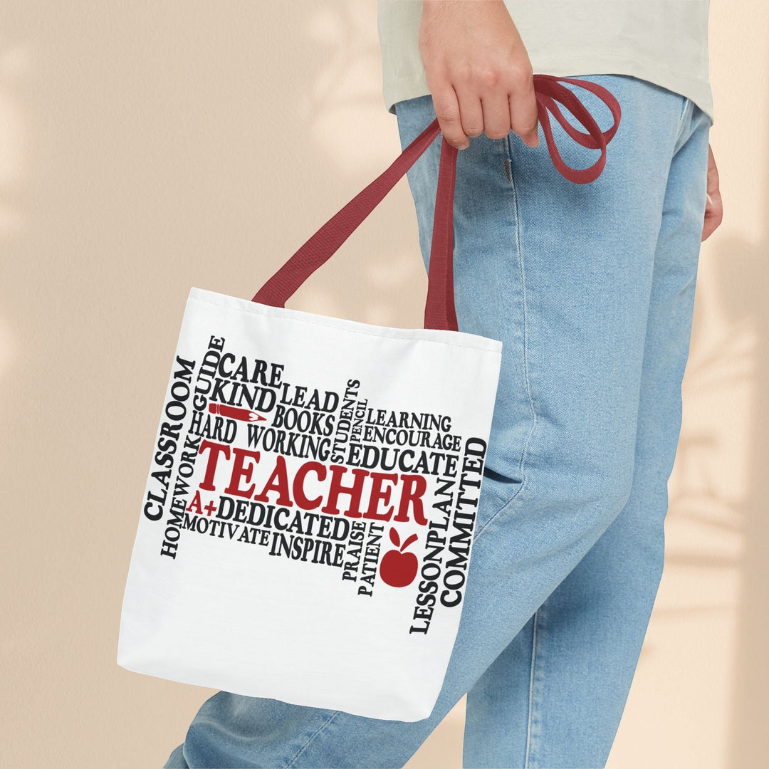 Sea Dragon Dreams What is a Teacher tote bag with red handles and black and red typography on white polyester fabric.