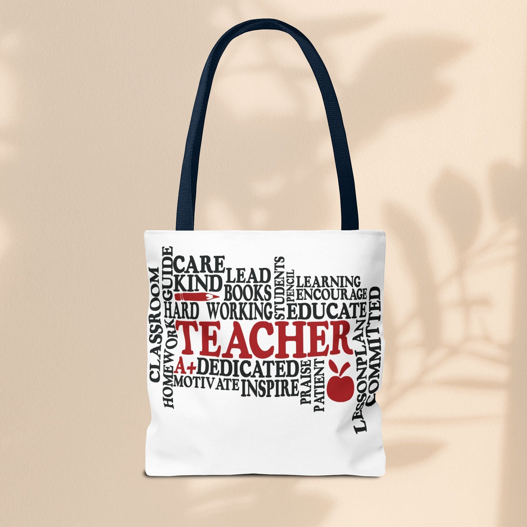 Sea Dragon Dreams What is a Teacher tote bag with black handles and red and black typography on white polyester.