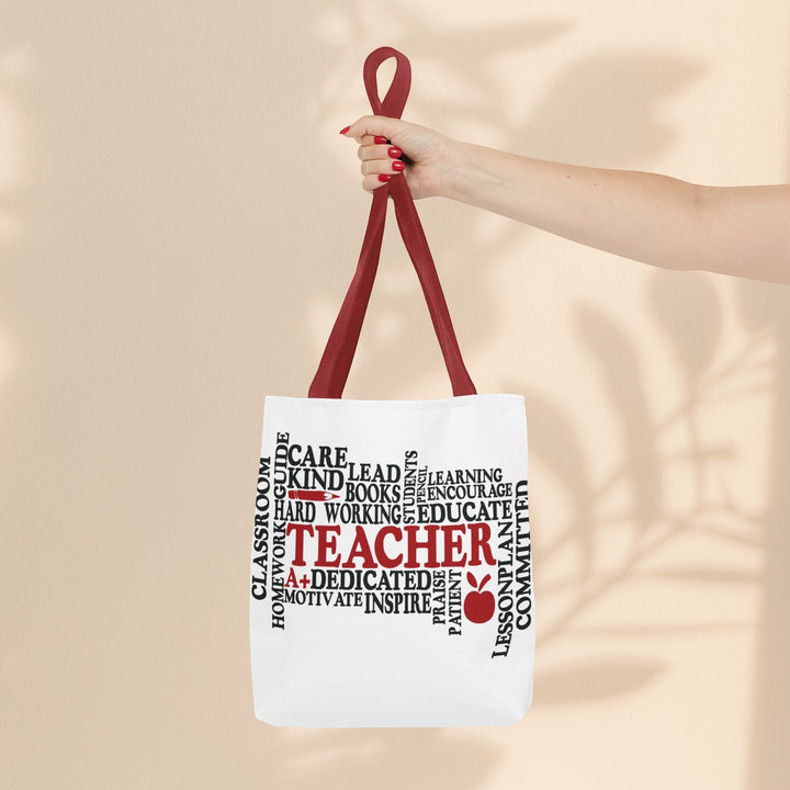 Sea Dragon Dreams What is a Teacher tote bag with red handles and black and red typography on white polyester fabric