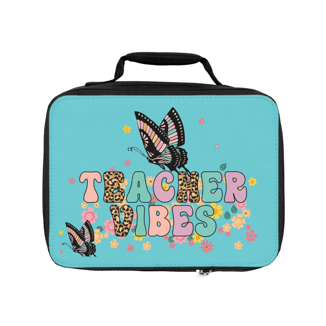 Sea Dragon Dreams Teacher Vibes lunch bag in blue with butterfly, flower, and leopard print text design.