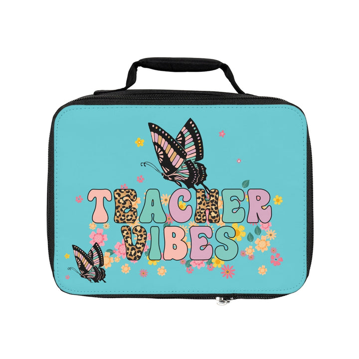 Sea Dragon Dreams Teacher Vibes lunch bag in blue with butterfly, flower, and leopard print text design.
