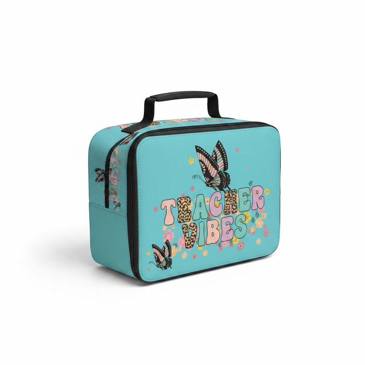 Sea Dragon Dreams Teacher Vibes lunch bag in light blue polyester with butterfly, flower, and leopard print lettering.