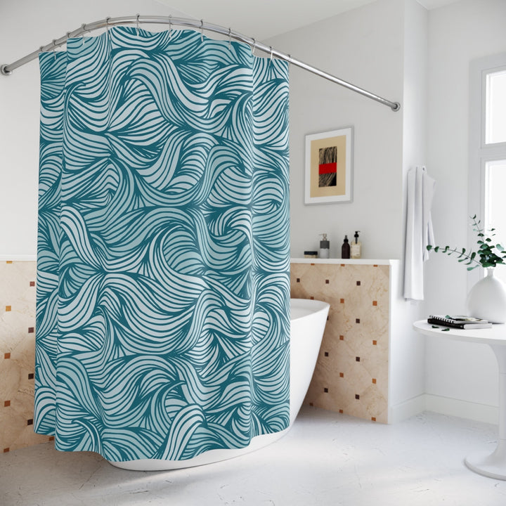 Sea Dragon Dreams teal and white wavy pattern polyester shower curtain hanging in a modern coastal bathroom