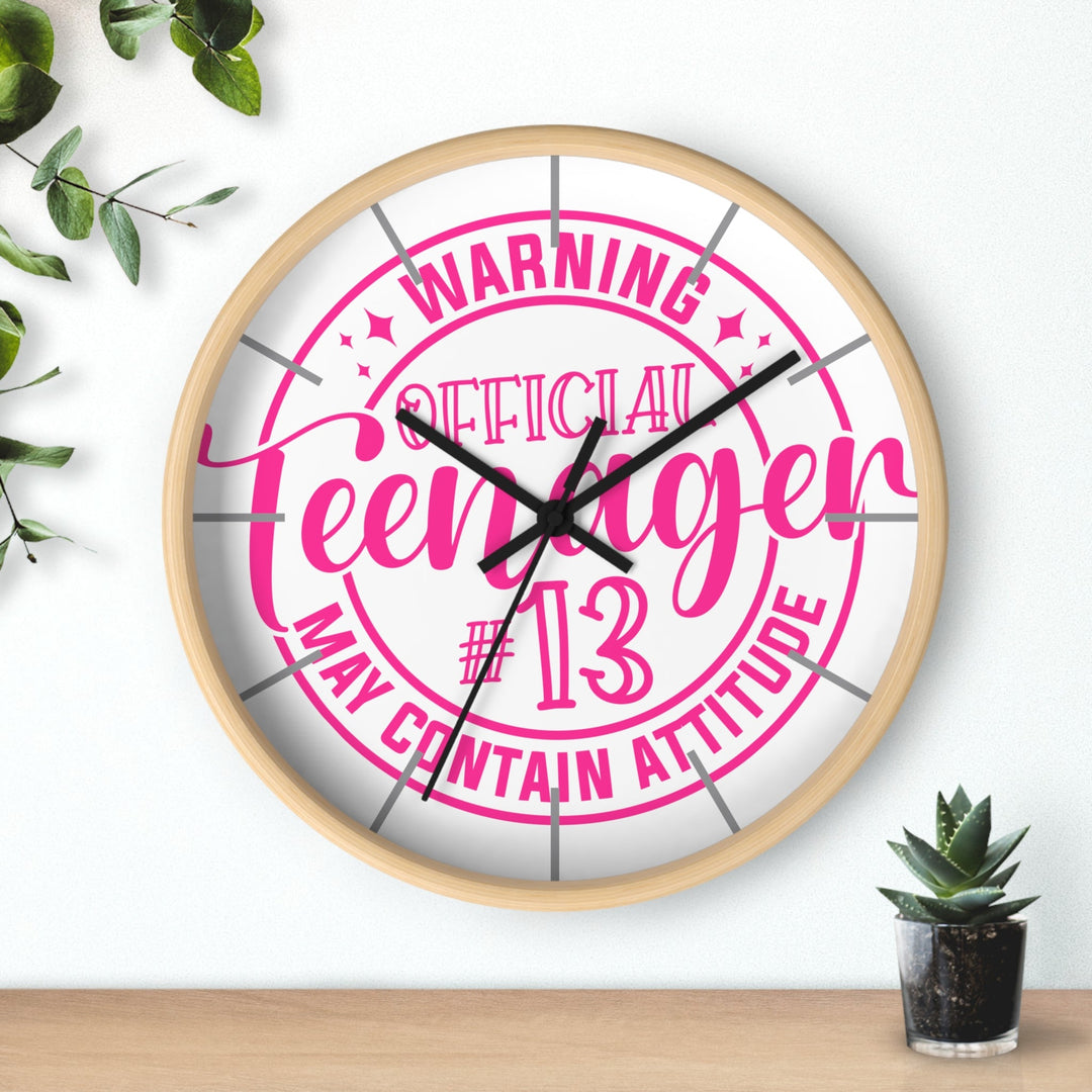 Sea Dragon Dreams wooden wall clock with a pink Official Teenager #13 May Contain Attitude graphic on a white face.