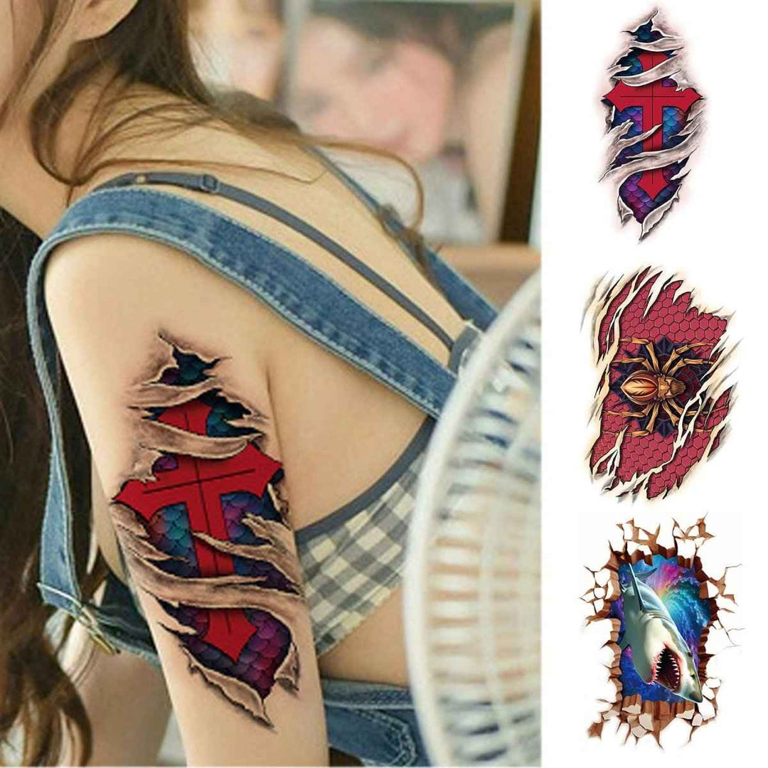 Sea Dragon Dreams temporary tattoo set featuring a red cross, spider, and 3D shark design on a woman's arm.