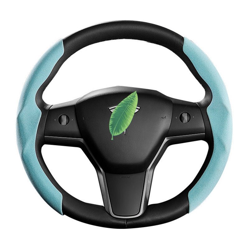 Sea Dragon Dreams Alcantara steering wheel cover for Tesla Model 3 and Y in black and light blue with leaf icon