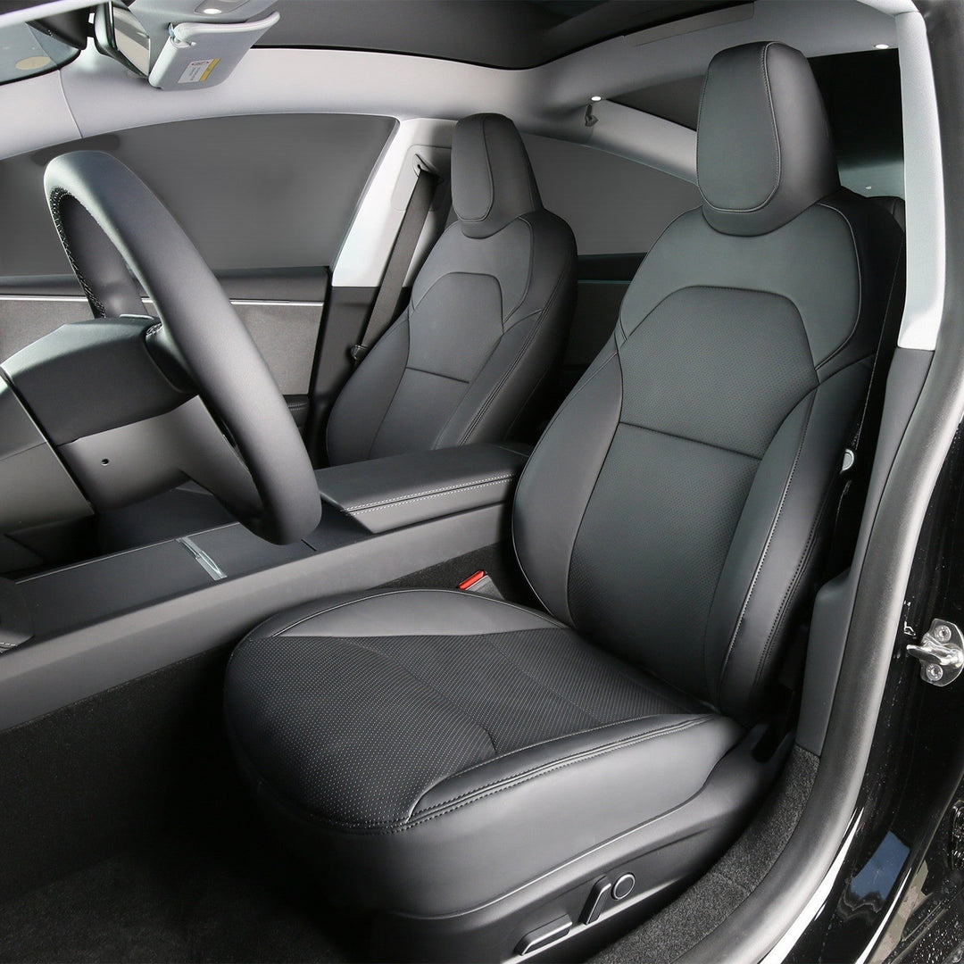 Sea Dragon Dreams black leather seat covers installed in a Tesla Model 3 Highland interior for a premium look.