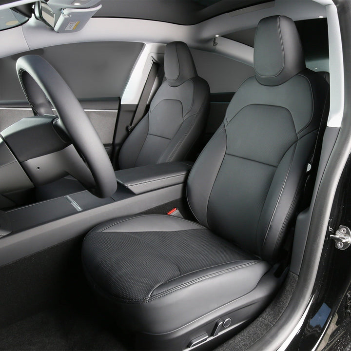 Sea Dragon Dreams black leather seat covers installed in a Tesla Model 3 Highland interior for a premium look.