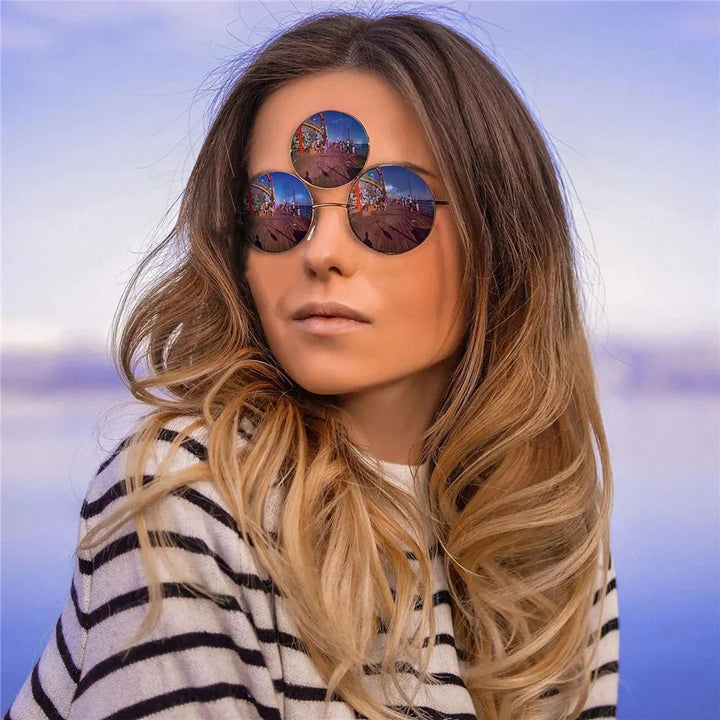 Sea Dragon Dreams novelty third-eye round sunglasses with reflective lenses worn by a woman for a mythology cosplay look