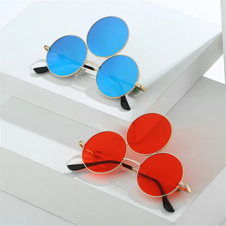 Sea Dragon Dreams novelty third-eye round sunglasses in blue and red with gold metal frames for cosplay costumes.