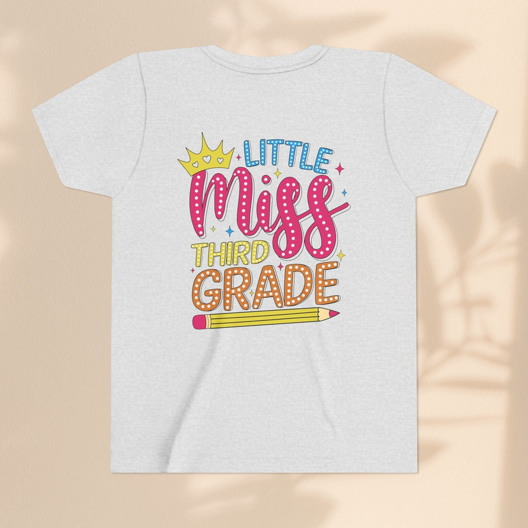 Sea Dragon Dreams youth t-shirt in light grey cotton with Little Miss Third Grade graphic and pencil illustration