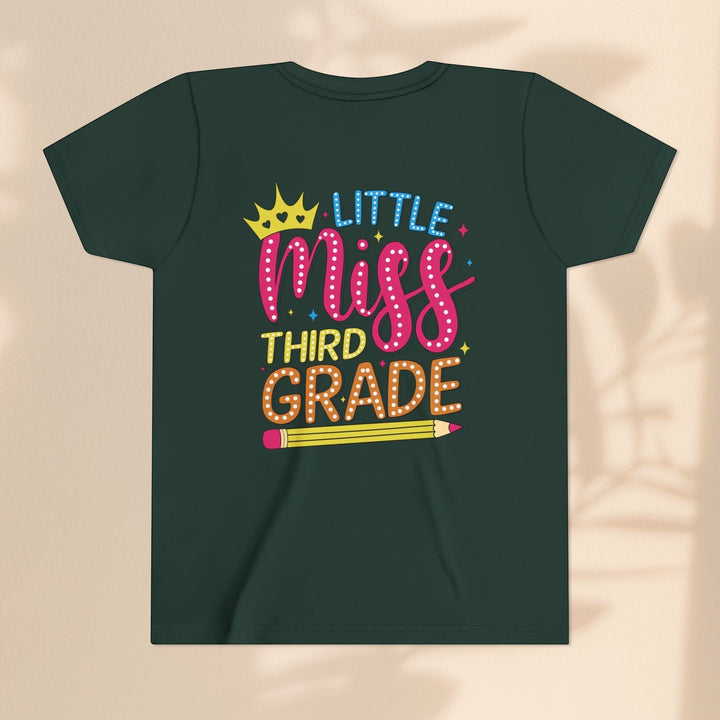 Sea Dragon Dreams dark green youth t-shirt with Little Miss Third Grade graphic featuring a crown and pencil design.