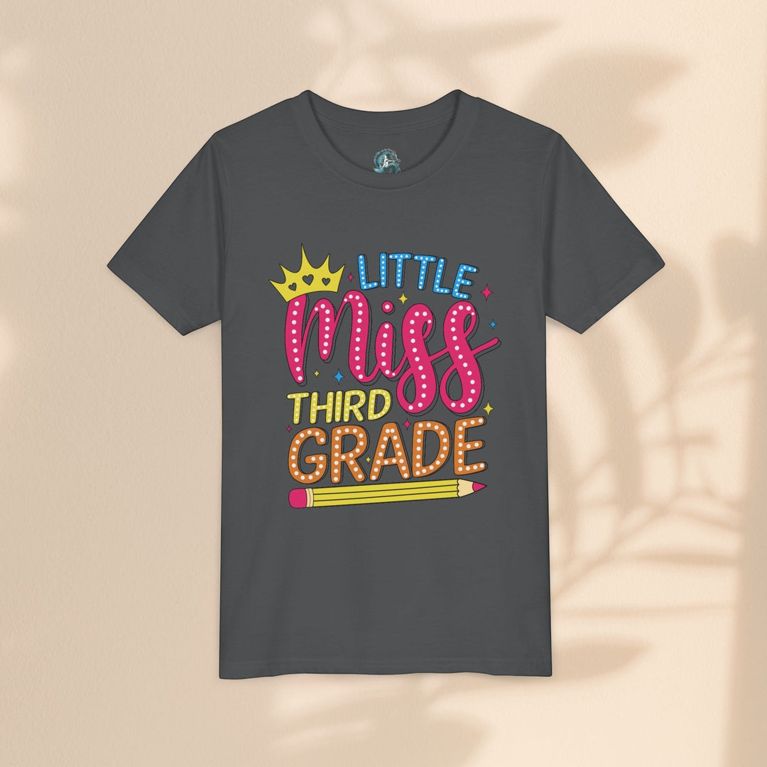 Sea Dragon Dreams youth t-shirt in dark grey with Little Miss Third Grade graphic featuring a crown and pencil
