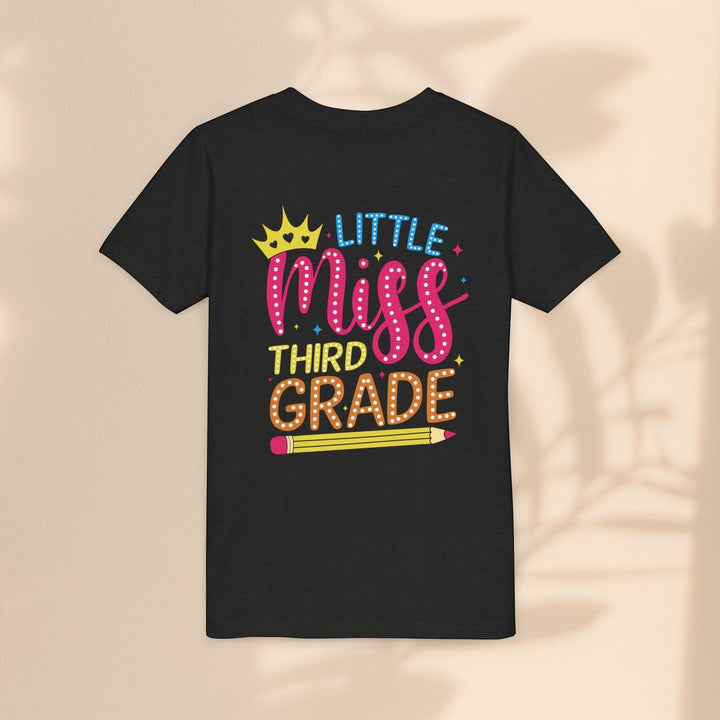 Sea Dragon Dreams black youth t-shirt with Little Miss Third Grade graphic featuring a crown and pencil design.