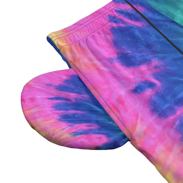Sea Dragon Dreams men's polyester tie-dye shorts featuring a vibrant pink and blue pattern with an elastic waistband.