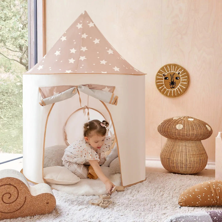 Sea Dragon Dreams Tiny Land Discovery 5-in-1 play tunnel tent with star pattern in a cozy child's playroom