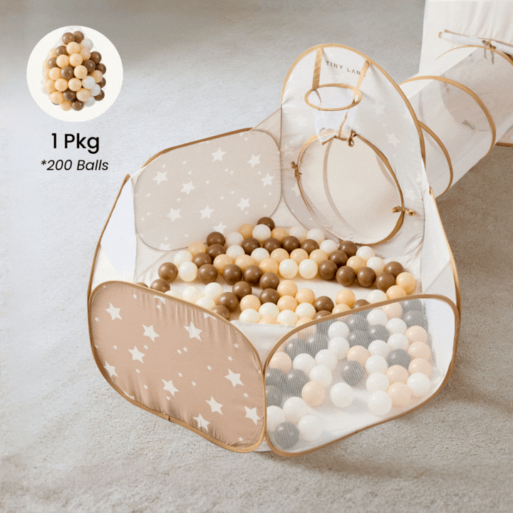 Sea Dragon Dreams Tiny Land 5-in-1 foldable play tunnel and ball pit in beige with white star pattern and play balls