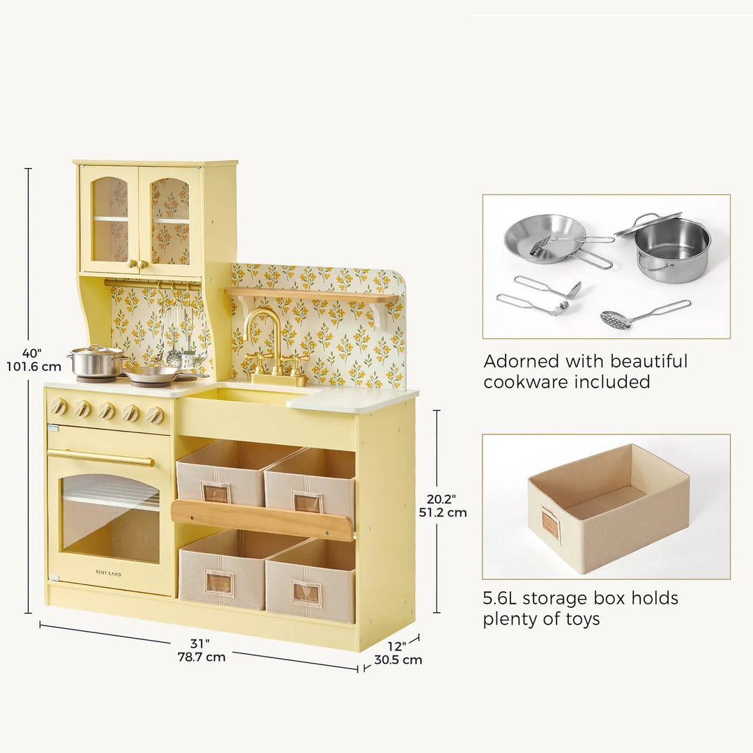 Sea Dragon Dreams Tiny Land wooden play kitchen in pale yellow with floral backsplash, storage bins, and cookware.