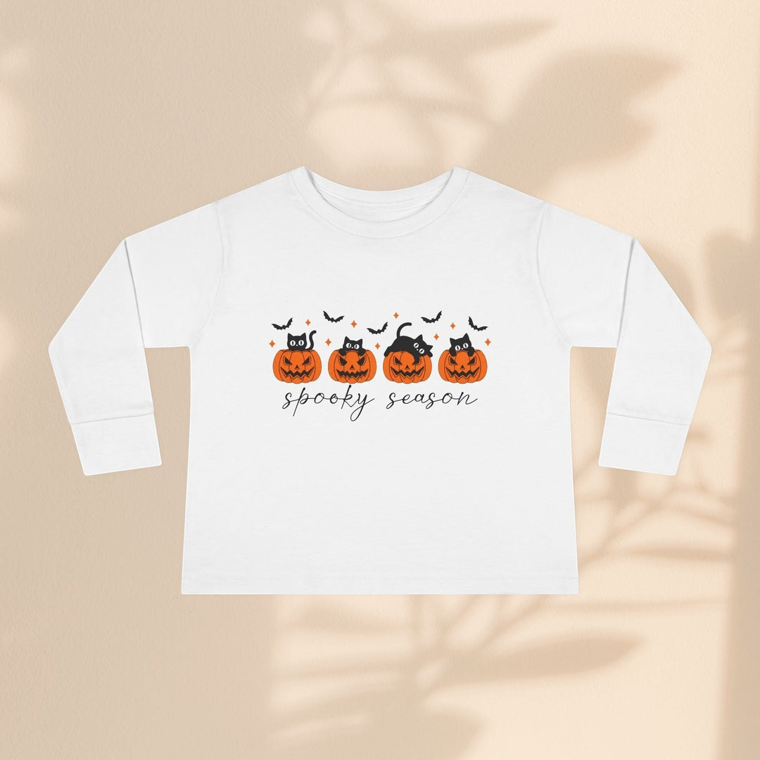 Sea Dragon Dreams white toddler long sleeve tee with spooky season pumpkin and black cat Halloween graphic print