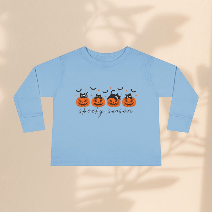 Sea Dragon Dreams toddler long sleeve tee in light blue with black cats and orange pumpkins for Halloween