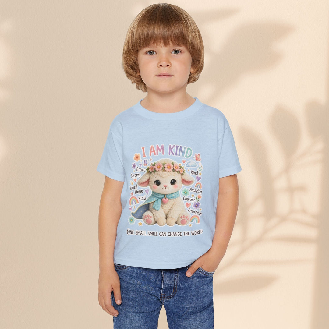 Sea Dragon Dreams toddler wearing a light blue cotton t-shirt with a Grace Lamb illustration and I Am Kind text.