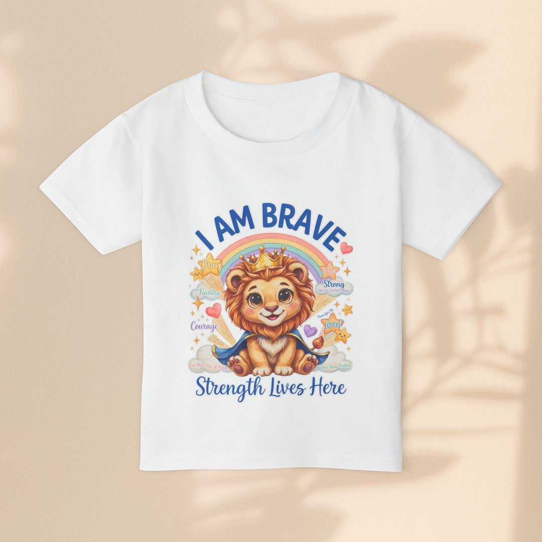 Sea Dragon Dreams white cotton toddler t-shirt with a cute Leo Lion graphic, rainbow, and I Am Brave text.