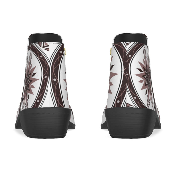 Sea Dragon Dreams women's fashion boots featuring a bold tribal-inspired print on white micro suede with black soles.