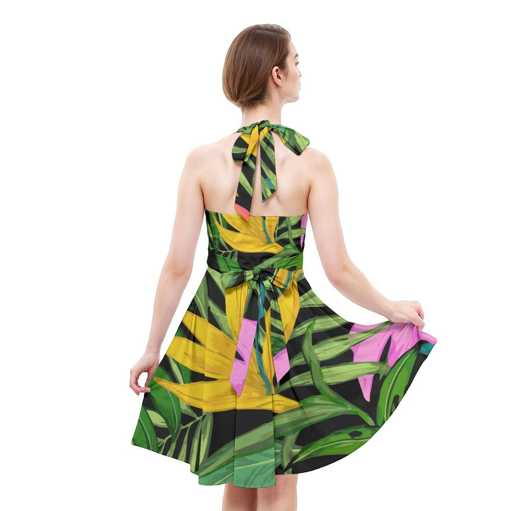 Sea Dragon Dreams tropical print halter-neck skater dress with a fit-and-flare silhouette, back view on a model.