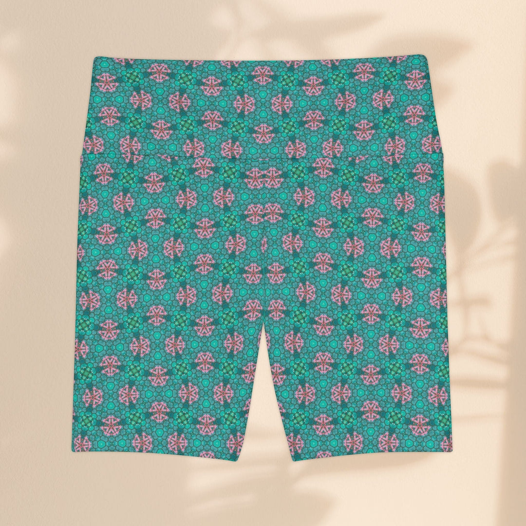 Sea Dragon Dreams women's workout shorts in teal and pink tropical geometric print, made of durable polyester.