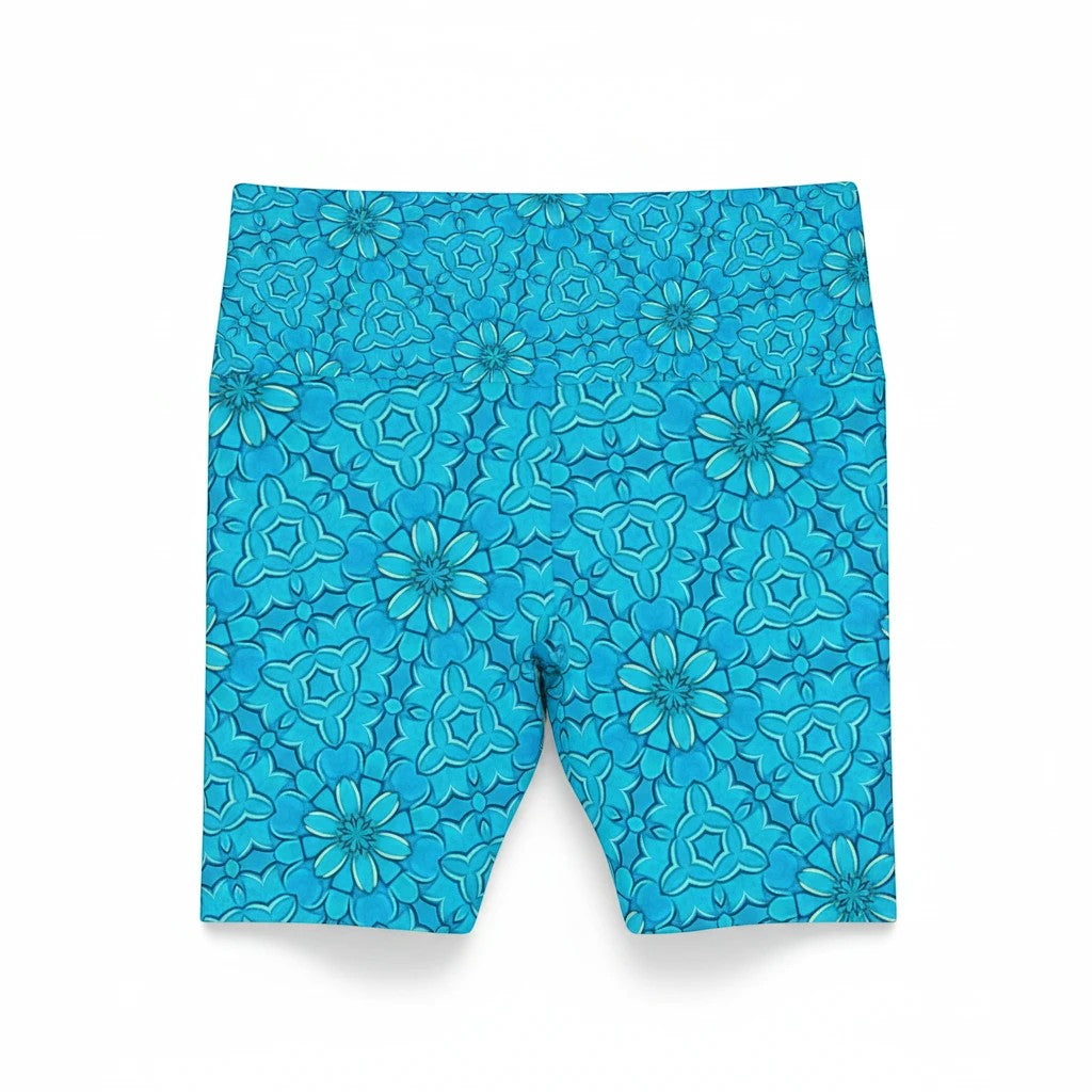 Sea Dragon Dreams turquoise workout shorts featuring a vibrant groovy floral pattern in lightweight polyester.