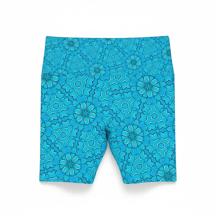 Sea Dragon Dreams turquoise workout shorts featuring a vibrant groovy floral pattern in lightweight polyester.